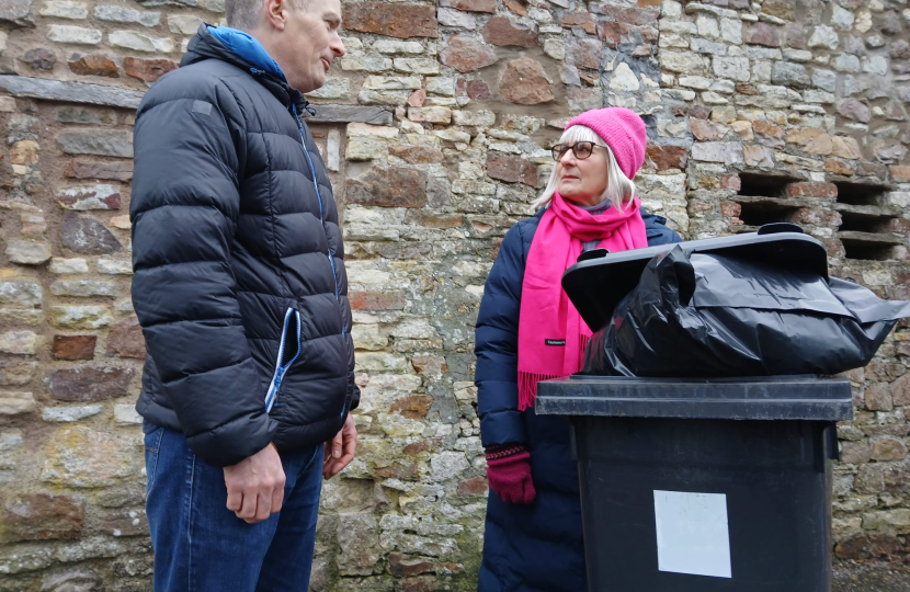 Steve Smith talking to local resident about bin collection